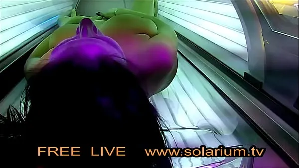 XXX Horny Girl with big breasts masturbates under the solarium total Film