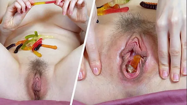 XXX Neighbour is preparing cummy gummies by inserting candies in pussy and butthole for flavour skupno število filmov